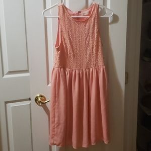Pink sleeveless dress with lace detail